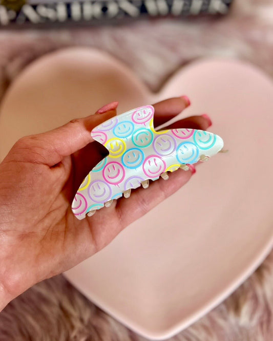 Preppy Plans - Large white smiley claw with colorful smile faces