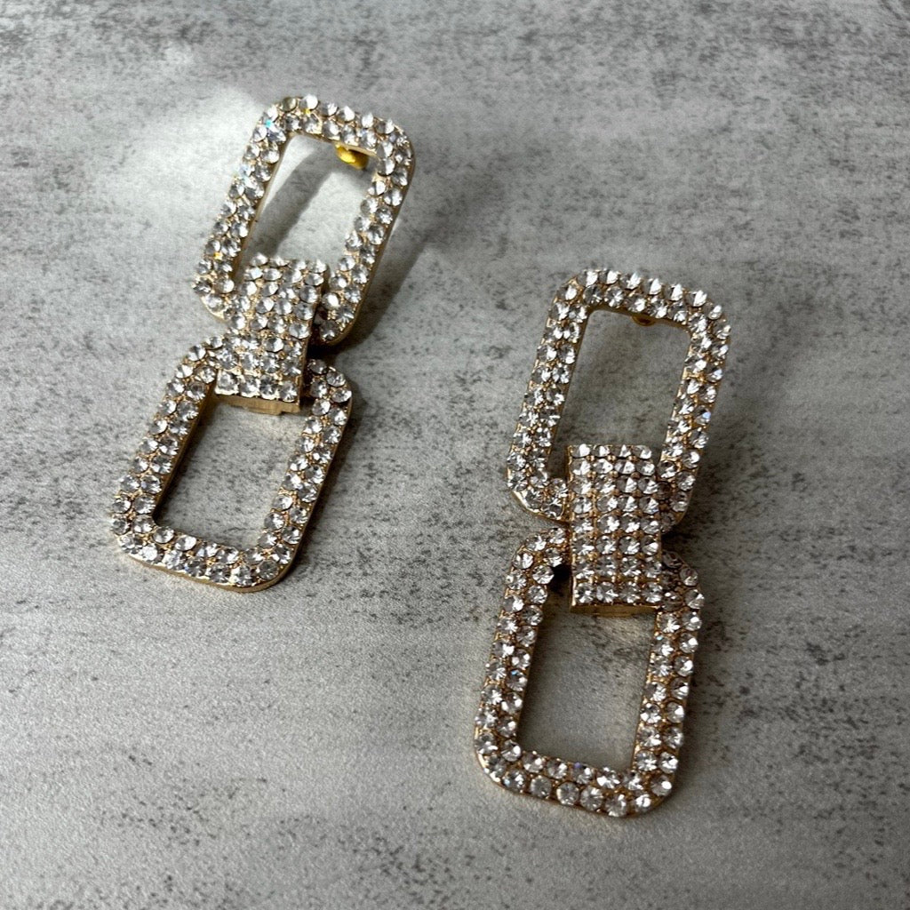Statement gold rhinestone earrings