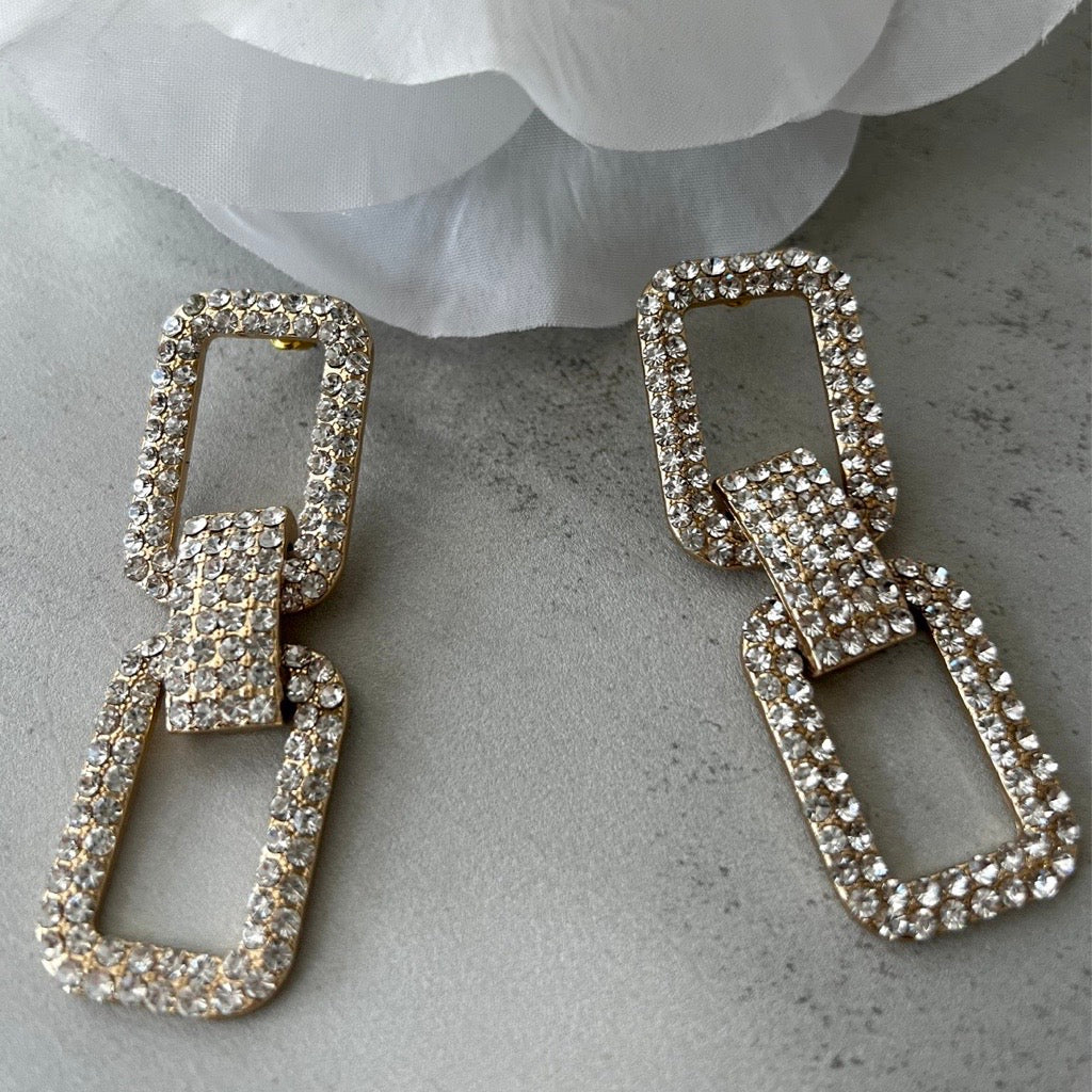 Statement gold rhinestone earrings