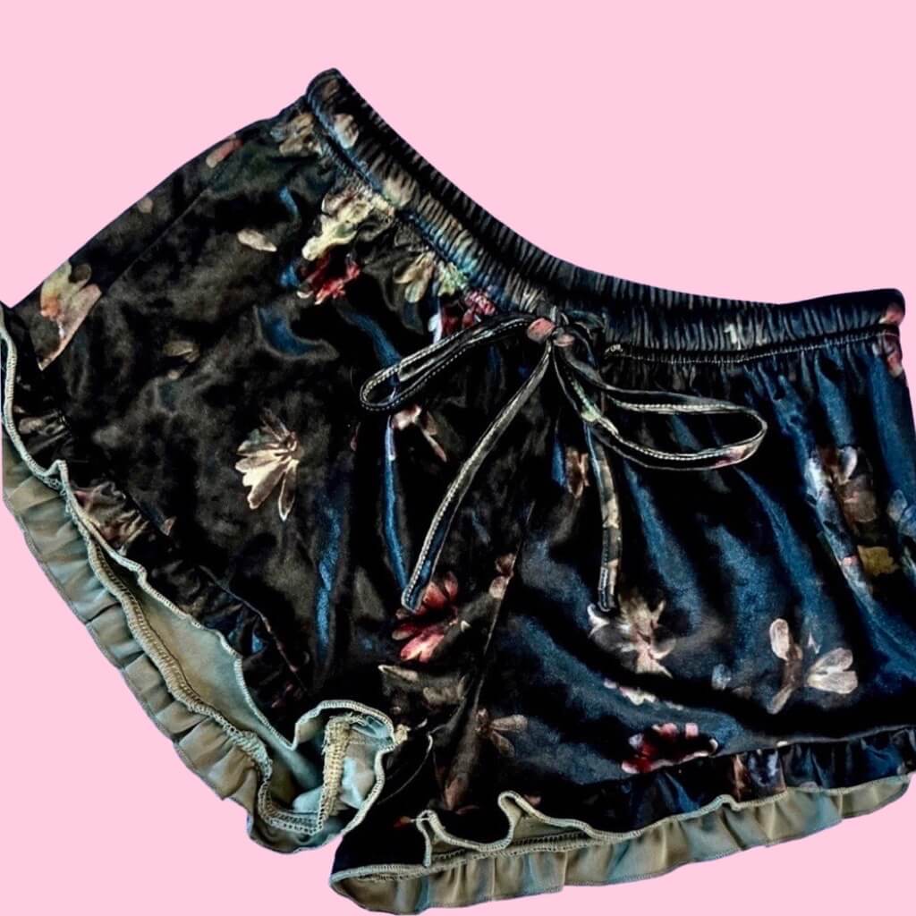 crushed velvet shorts. Scattered dark florals on black shorts